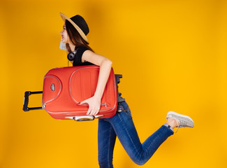happy woman with a suitcase, vacation, independent travel