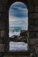 Passaggio ad arco sul molo di Cefalù, Sicilia