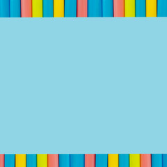 multi  Colorful pipe with copy space for your text on blue background. / education, creativity and feeling happy
