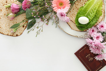 Pesah celebration concept (jewish Passover holiday). Traditional book with text in hebrew: Passover Haggadah (Passover Tale).