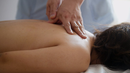 Fototapeta na wymiar Spa. In the massage bank create a vacuum against the background of a woman