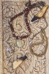 collection of jewelry on wooden background