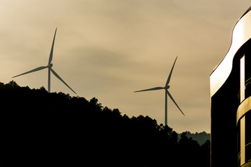 Windmills are producing electric for our world.