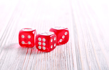 Three red dices