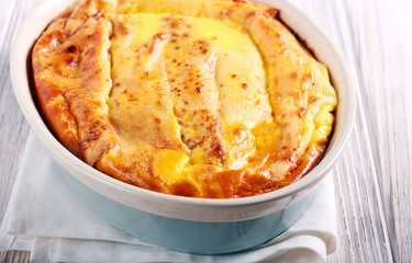 Pancake rolls with cheese filling, baked