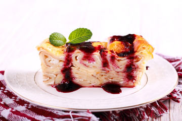 Pancake roll cake with jam topping