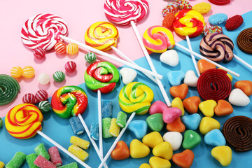candies with jelly and sugar. colorful array of different childs sweets and treats.