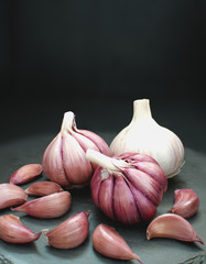 Garlic. Fresh Garlic. Cloves of garlic on black background