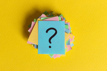 colorful question marks written reminders tickets. ask or business concept
