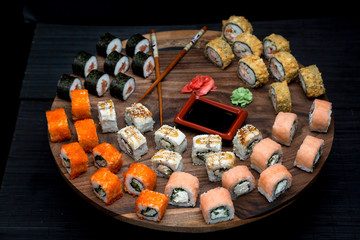 Big sushi set with shrimps, eel and salmon.