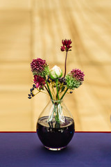 Beautiful decor at the weddingin. Jars with colored water