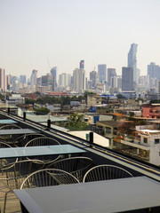 Bangkok's skyline viewed from a rooftop bar