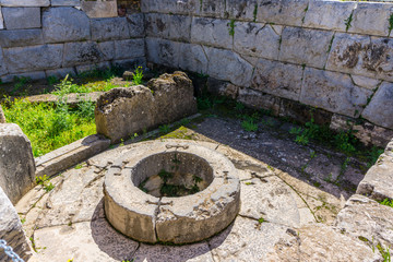 Archaeological site of Eleusis (Eleusina). Well of the fair dances (Callichoron Well) where Eleusinian omen performed dances during the ceremony in honor of  goddess Demeter