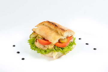 Delicious ham sandwich with tomatoes and salad