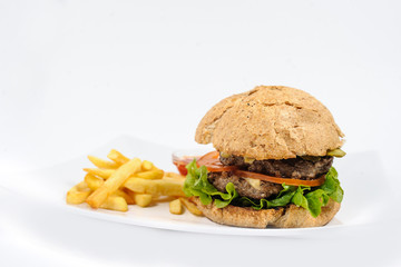 Fried Potatoes with ketchup and hamburger/burger