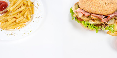 Fried Potatoes with ketchup and hamburger/burger