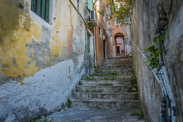 Fototapeta na wymiar Stairs in the aleys of Greece 