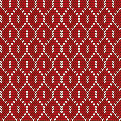 Fantasy seamless geometric pattern. Knitted red white background with original pattern. For decoration, design, postcards, invitations, packaging paper, bags, fabrics, knitting.
