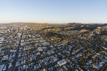 Aerial morning view of neighborhood homes and Hollywood Blvd in Los Angeles California.