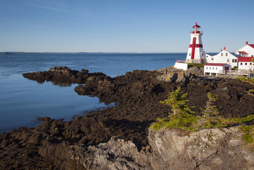 Fototapeta na wymiar Head Harbor Lighthouse with Lowest Tide on Campobello Island in Canada