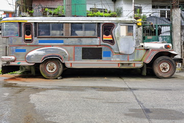 Filipino grey-silvery dyipni-jeepney car stationed in Baguio town-Benguet province-Philippines. 0248