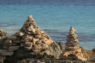 Stone cairns at Cape Salines Majorca Spain