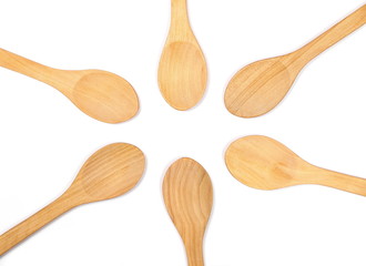 set empty wooden spoons isolated on white background