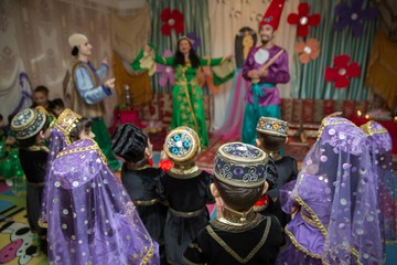 Novruz holiday background . The national costume of the Azerbaijani national hat and cap