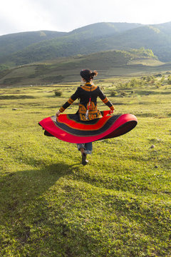 Beautiful Chinese Yi people in traditional costumes  outdoor