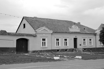 Typical rural landscape and peasant houses in Barcut, Bekokten, Brekolten, Transylvania, Romania....