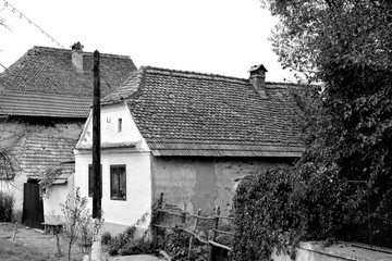 Typical rural landscape and peasant houses in Barcut, Bekokten, Brekolten, Transylvania, Romania....
