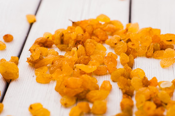 Dried grapes in a glass salad bow