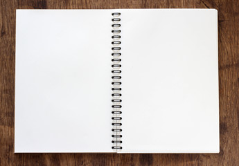 Pen notepad on the wooden background