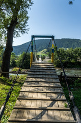 Small rope bridge over the river.