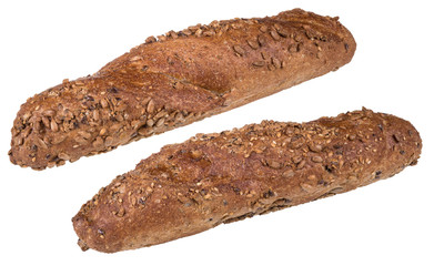 Wholegrain baguettes sprinkled with sunflower seeds. Two freshly baked crunchy bread rolls with a golden crust. Isolated on white background.