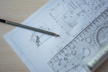 Architect's desktop. Plan of house. Architect workplace. Work with drawings. Office work. Engineer calculates area of the room. Architect's tools.