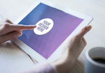 User with Tablet and Coffee on Wooden Table Mockup 2