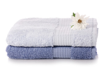 Fototapeta na wymiar A stack set of towels blue flower