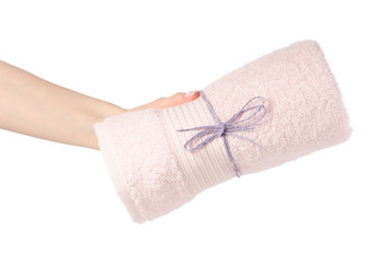 The pink towel roll in hand