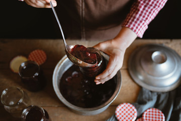 Preparing homemade strawberry jam