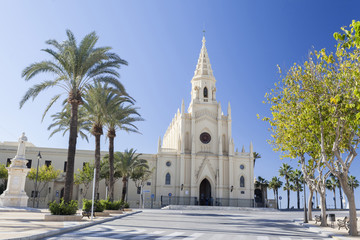 Fototapeta na wymiar Sanctuary of Nuestra Senora de la Regla, maritime promenade of Chipiona, Andalucia.Spain.
