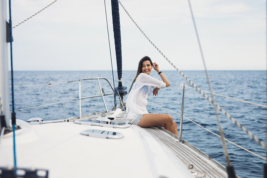 Woman Enjoying Sea on Sailboat