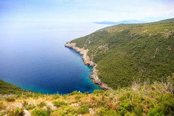 Fotobehang beautiful landscape, view of the green cliffs and the Adriatic sea © Sandra