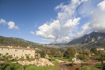 Obraz premium Village view, mountain, serra de Tramontana at background in Soller, Balearic Islands.Spain.