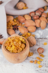 Ingredients for cooking bread or cookies: honeycomb, flour, raisines, mix of nuts, spices