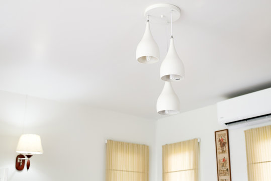 Lamps in a modern bedroom ,Warm tone light