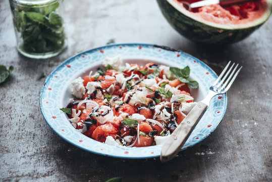 Food: Refreshing summer salad with watermelon,eschalot,mint,oliv