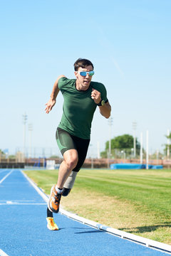 Amputee running on track