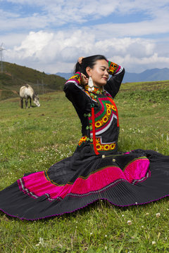 Beautiful Chinese Yi people in traditional costumes  outdoor