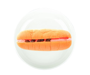 bread currant in white plate on white background